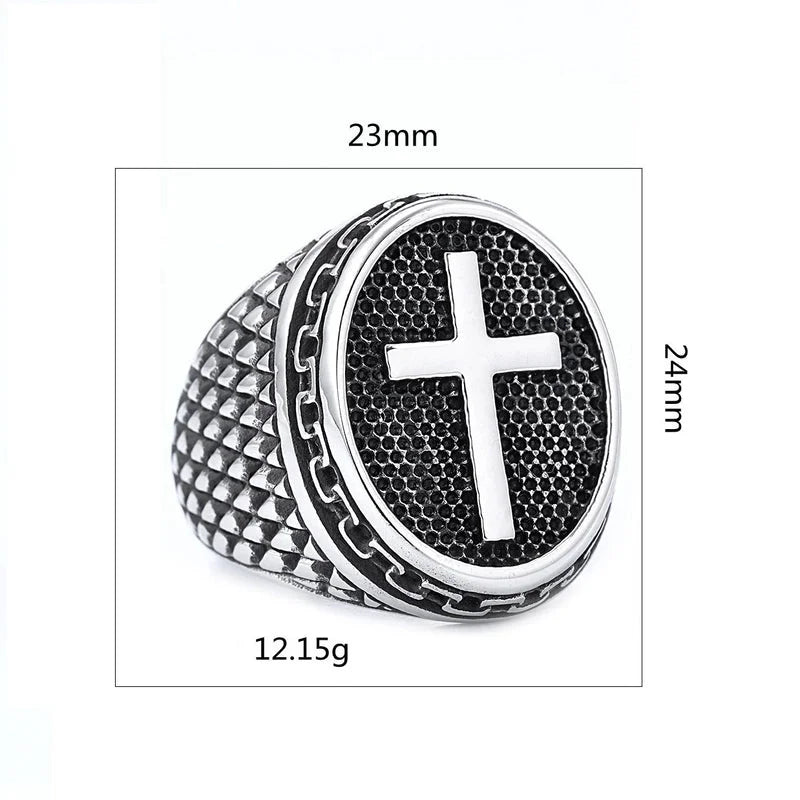 Silver ring with cross design and measurements on a white background
