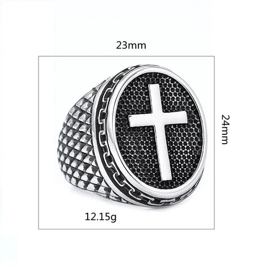 Silver ring with cross design and measurements on a white background