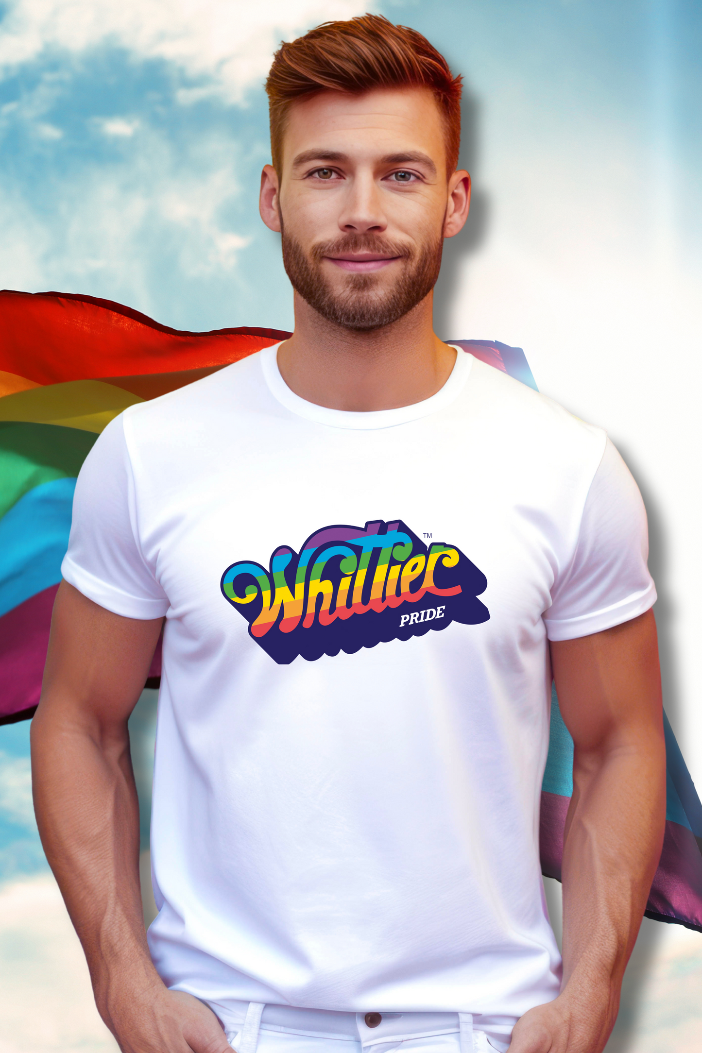 Man wearing a white t-shirt with 'Whitley Pride' design, rainbow flag in the background