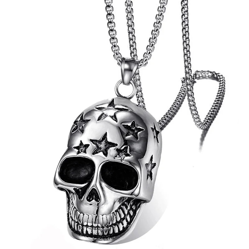 Silver skull pendant necklace with star details on a white background