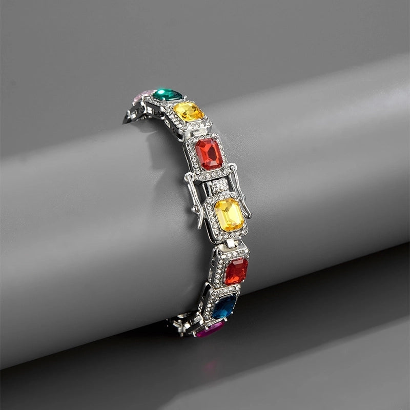 Bracelet with colorful gemstones on a gray surface