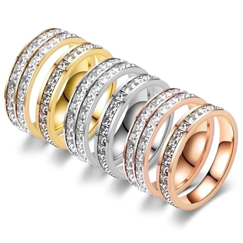 Elegant women’s stainless steel ring featuring round rhinestone design