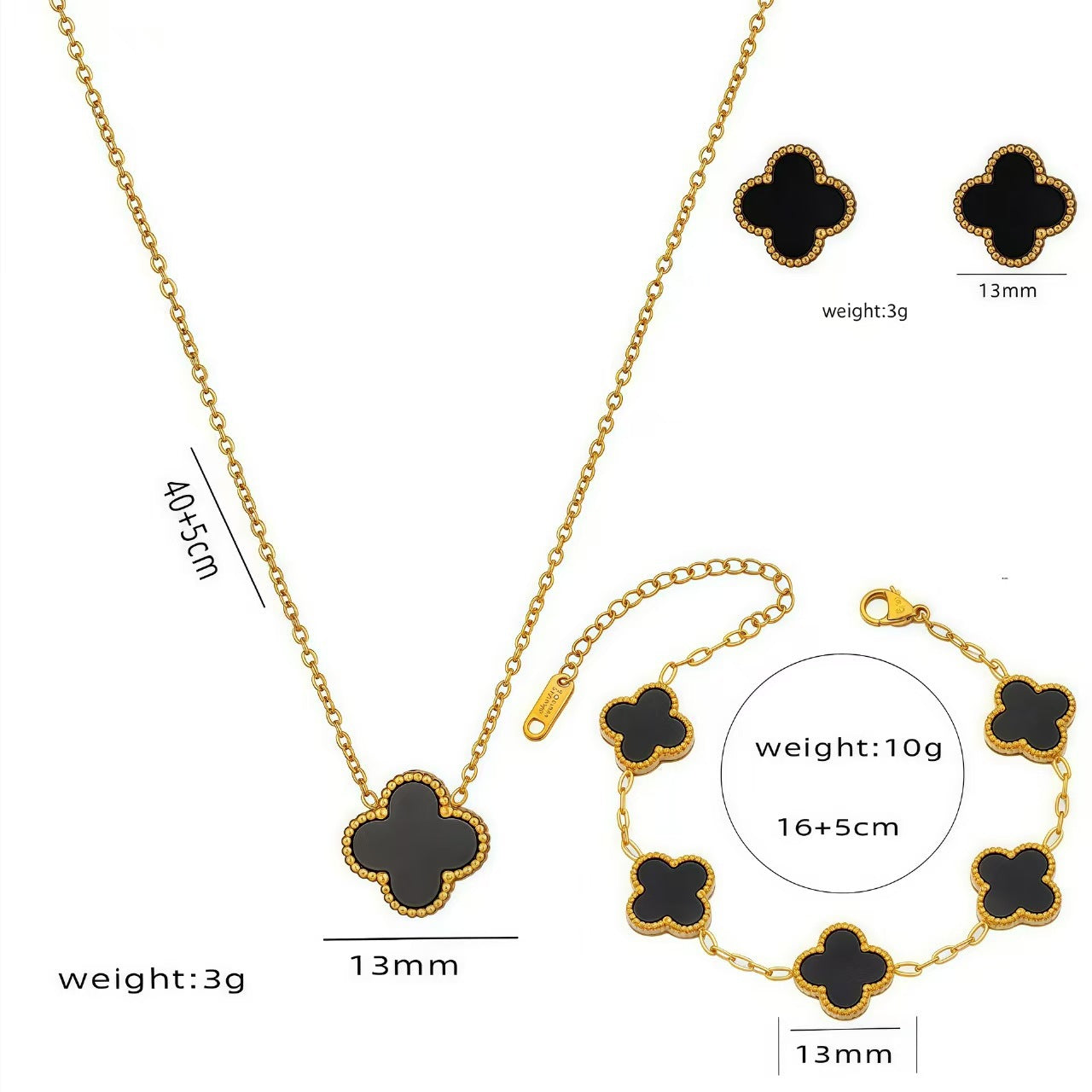Gold jewelry set with black clover-shaped pendants including necklace, bracelet, and earrings on a white background.