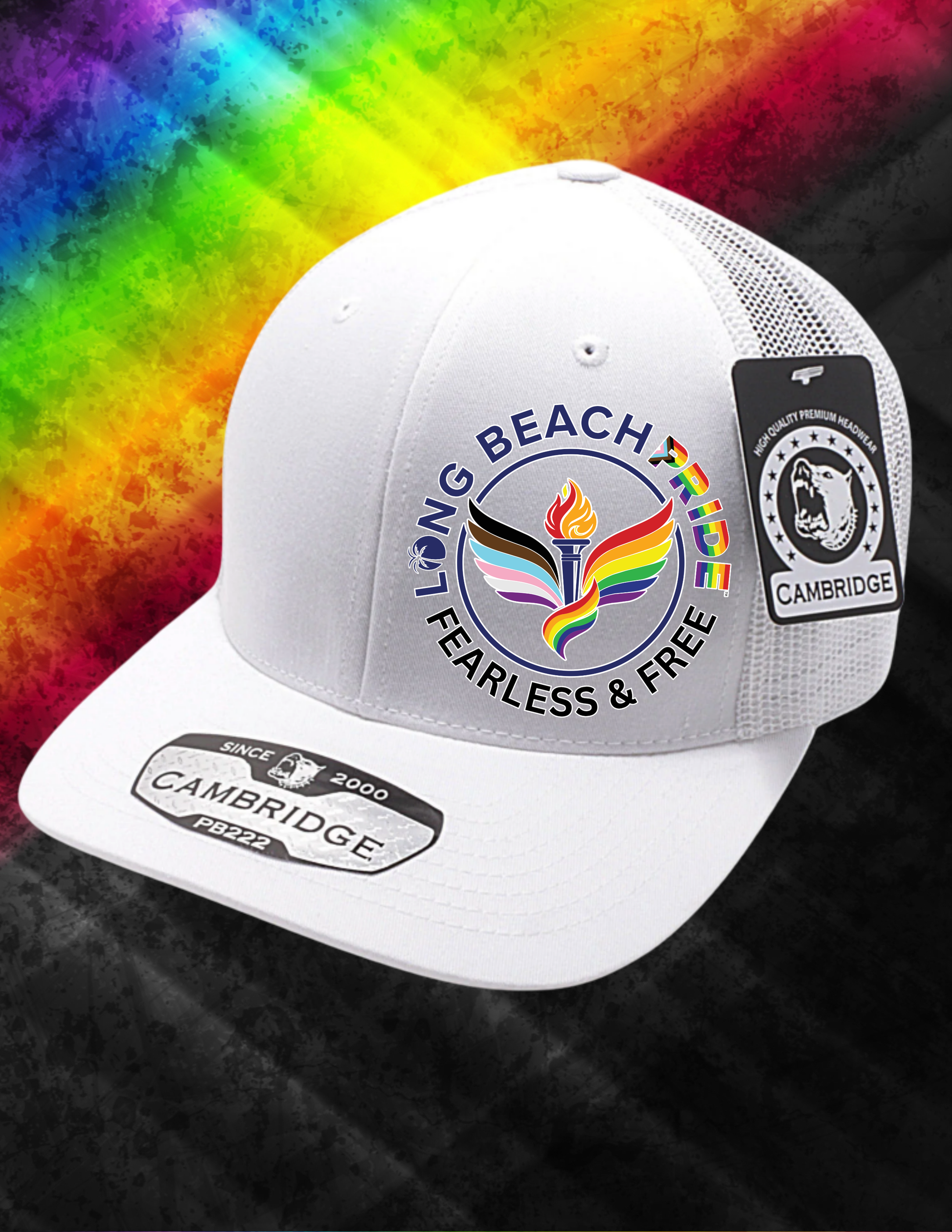 White cap with rainbow design and text on a colorful tie-dye background