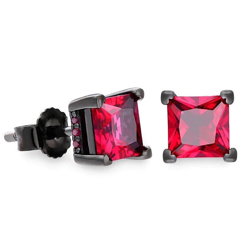 Red square gemstone stud earrings with black metal setting on a white background