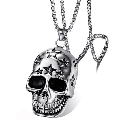Silver skull pendant necklace with star details on a white background