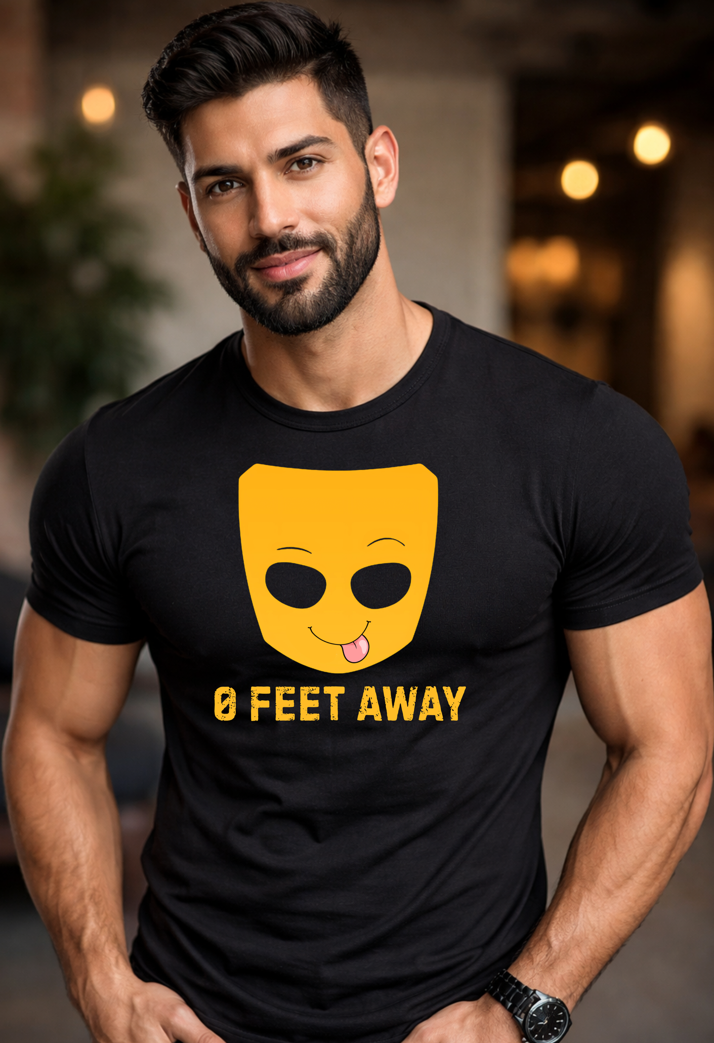 Man wearing a black t-shirt with a yellow emoji design and text.