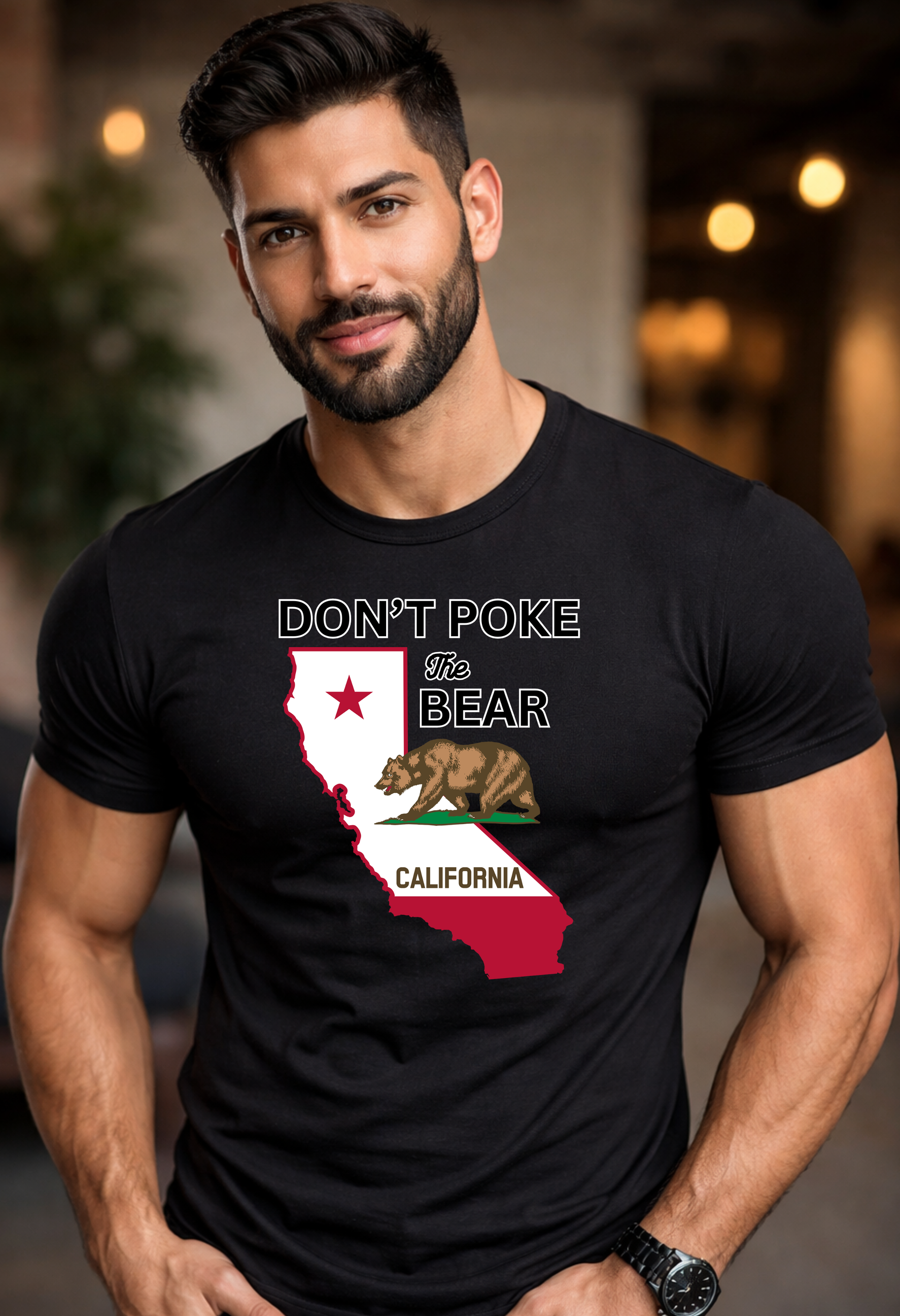 Man wearing a black t-shirt with a graphic design of California and text 'Don't Poke The Bear'.
