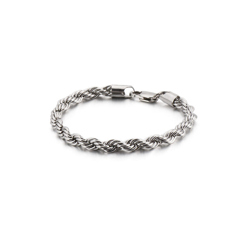 Silver braided bracelet on a white background