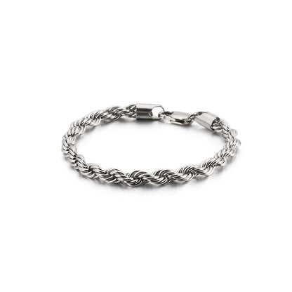 Silver braided bracelet on a white background