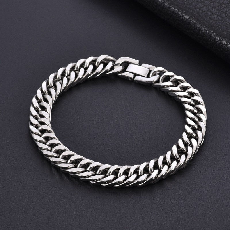 Silver chain bracelet on a dark background