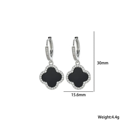 Pair of black clover-shaped earrings with silver accents, shown with measurements on a white background.